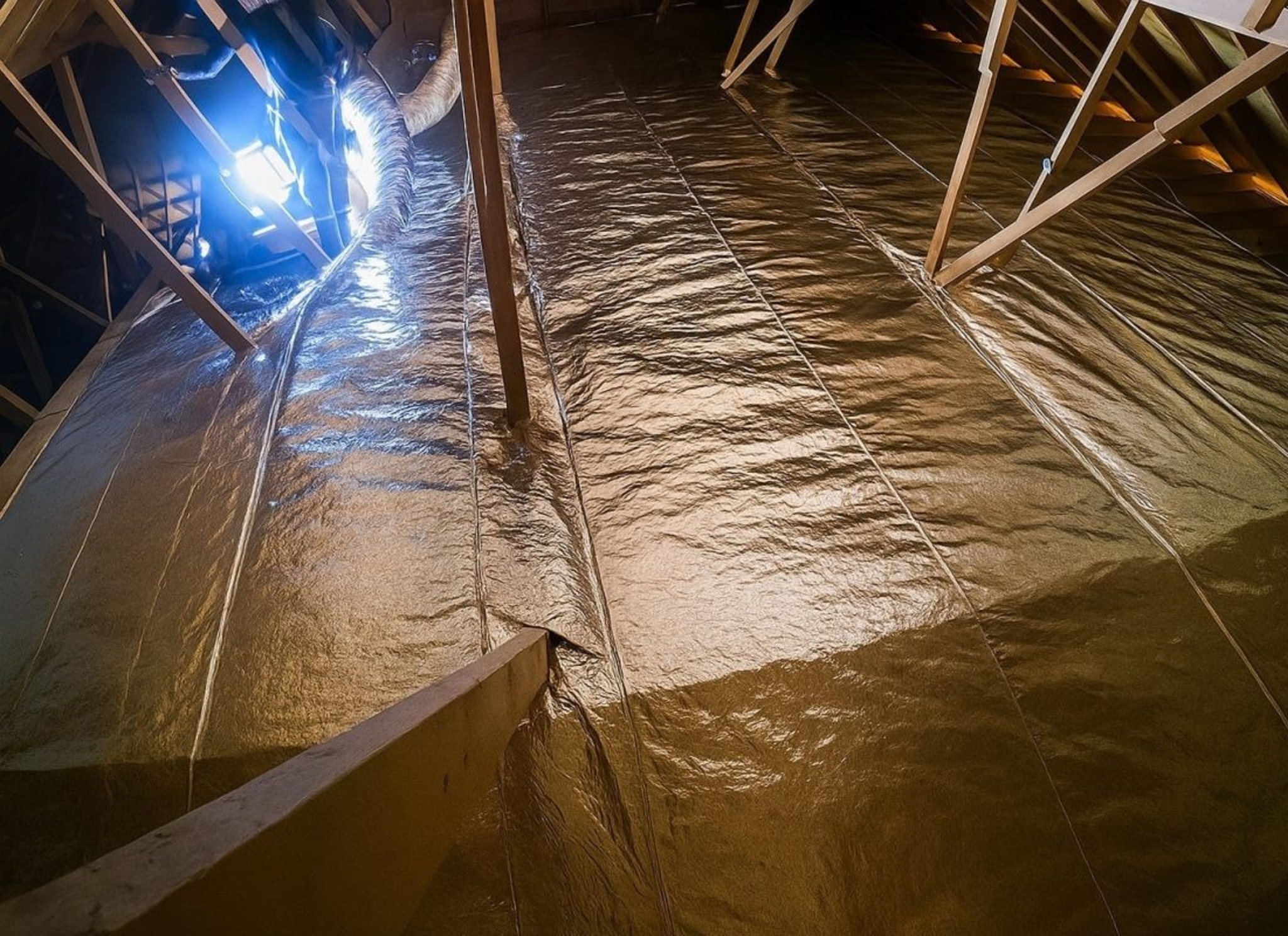 AttiicELEVATE installed across a residential attic floor